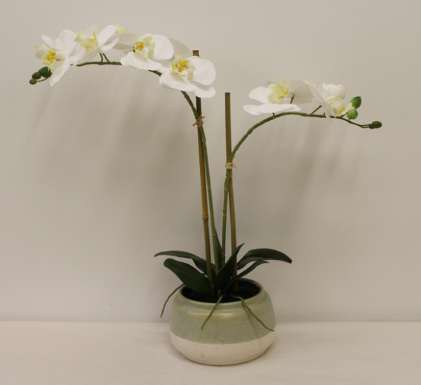 Artificial orchid in white vase height 51 cm